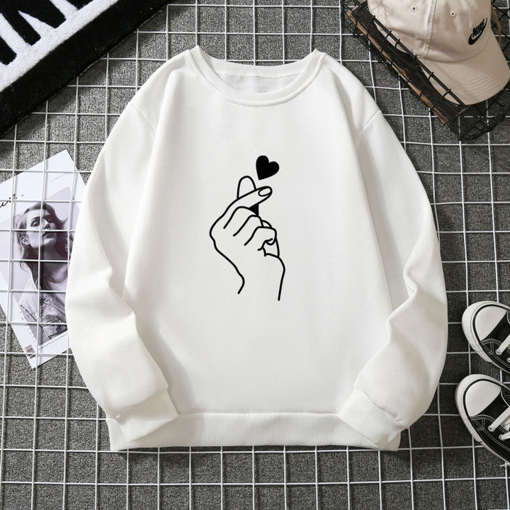 Kvinnotröja med kreativ handsymbolmotiv och mjukt innertyg Mirla-Eva Jonsson