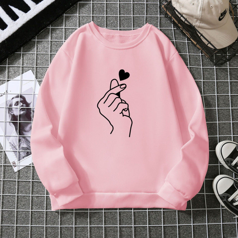 Kvinnotröja med kreativ handsymbolmotiv och mjukt innertyg Mirla-Eva Jonsson