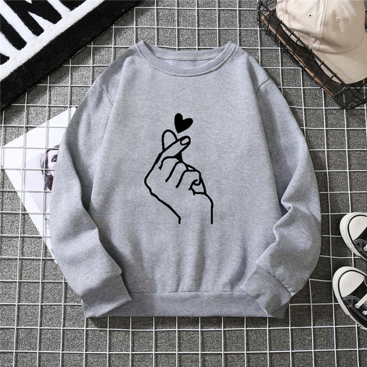 Kvinnotröja med kreativ handsymbolmotiv och mjukt innertyg Mirla-Eva Jonsson