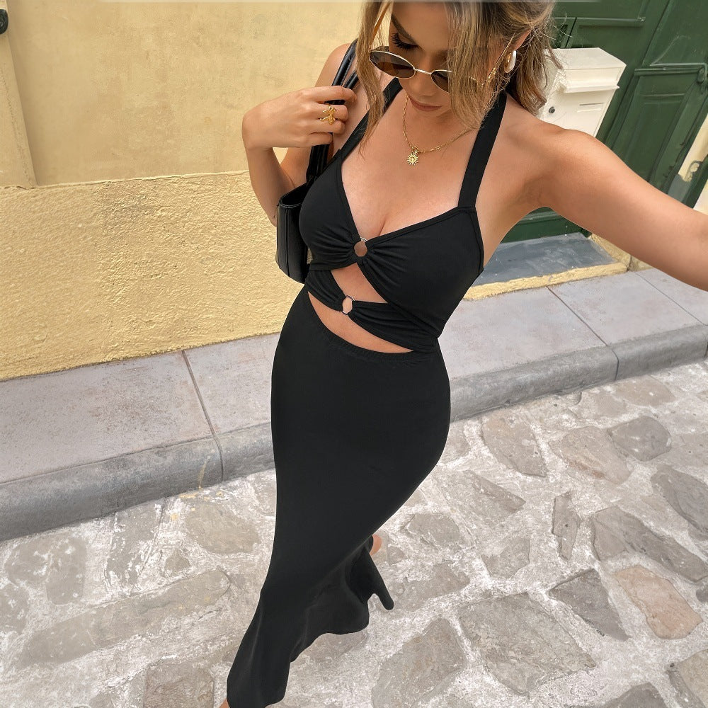 Kvinnotunika med sofistikerad utskärningsdesign och elegant slits Mirla-Eva Jonsson