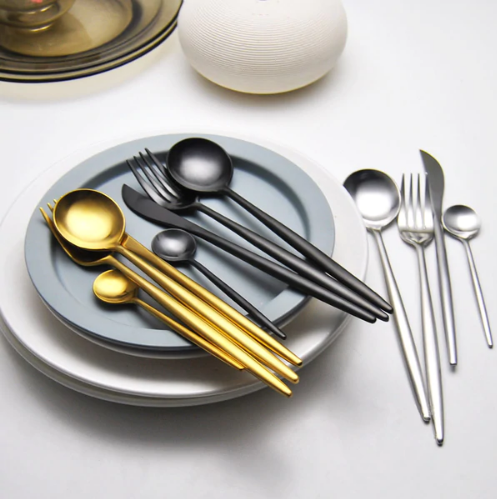 LUXUÖRSETT I ROSTFRITT STÅL 24-DELS GULD-SILVER BESTICKSET-Eva Jonsson