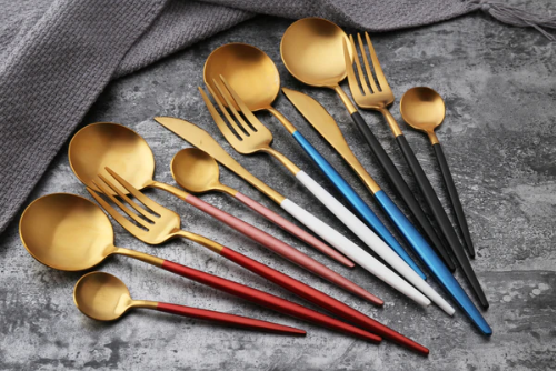 LUXUÖRSETT I ROSTFRITT STÅL 24-DELS GULD-SILVER BESTICKSET-Eva Jonsson