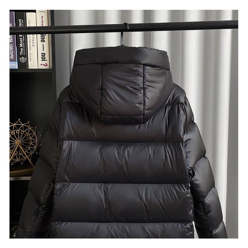 Lång pufferjacka - Varm - Huva - Dunjacka - Lång vinterjacka Dam-Eva Jonsson