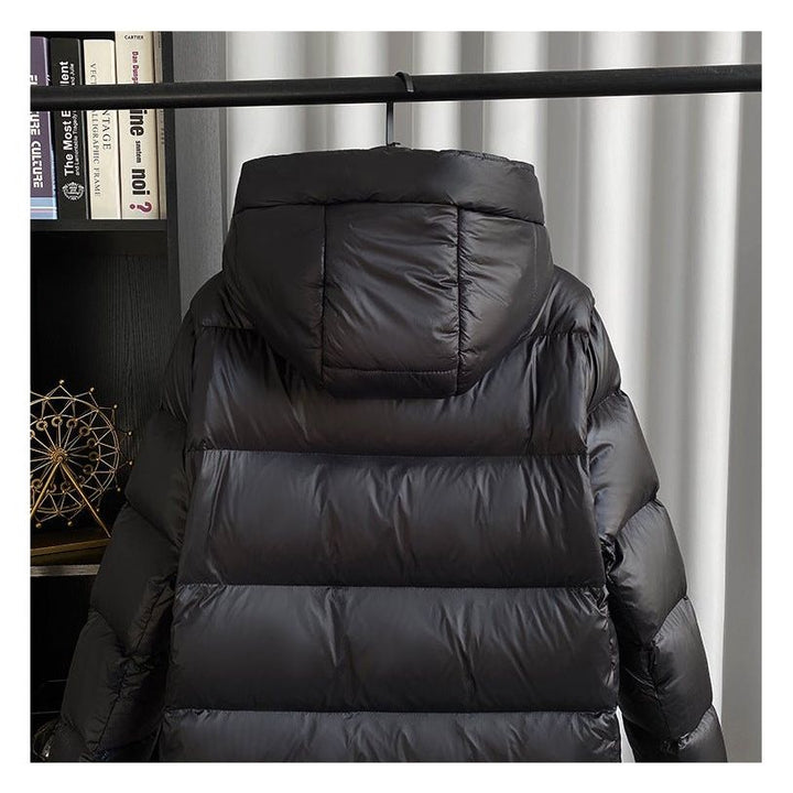 Lång pufferjacka - Varm - Huva - Dunjacka - Lång vinterjacka Dam-Eva Jonsson