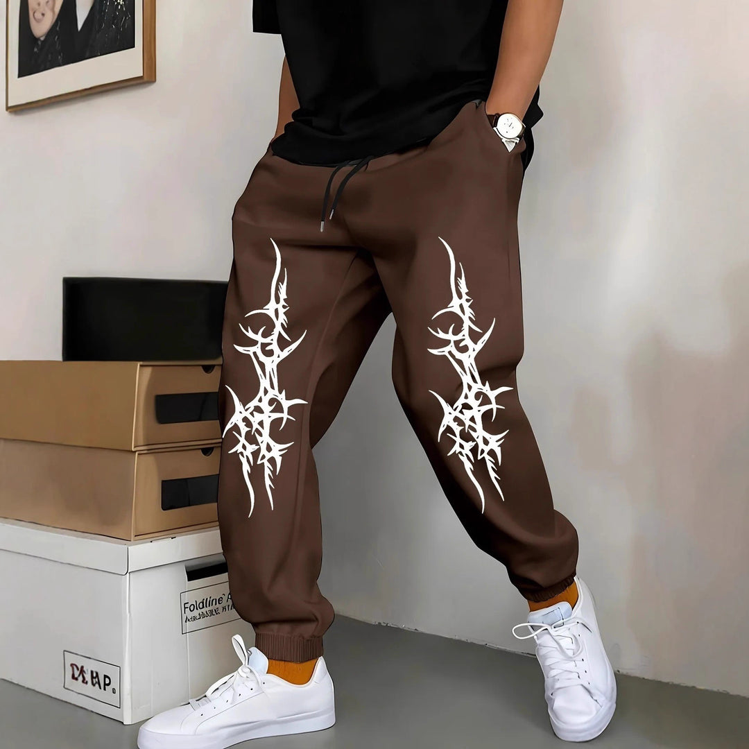 Mäns avkopplande joggingsbyxor med iögonfallande grafisk design Mirla-Eva Jonsson