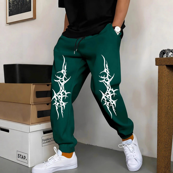 Mäns avkopplande joggingsbyxor med iögonfallande grafisk design Mirla-Eva Jonsson