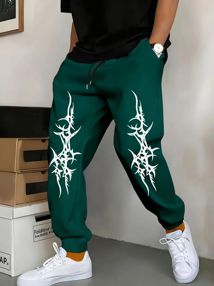 Mäns avkopplande joggingsbyxor med iögonfallande grafisk design Mirla-Eva Jonsson