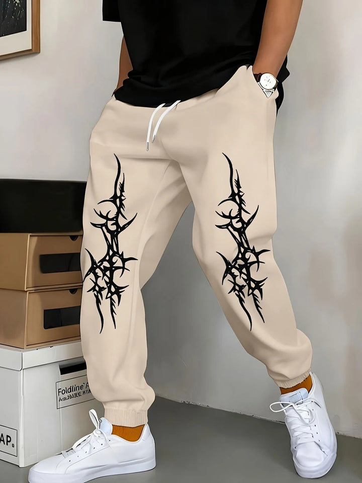 Mäns avkopplande joggingsbyxor med iögonfallande grafisk design Mirla-Eva Jonsson