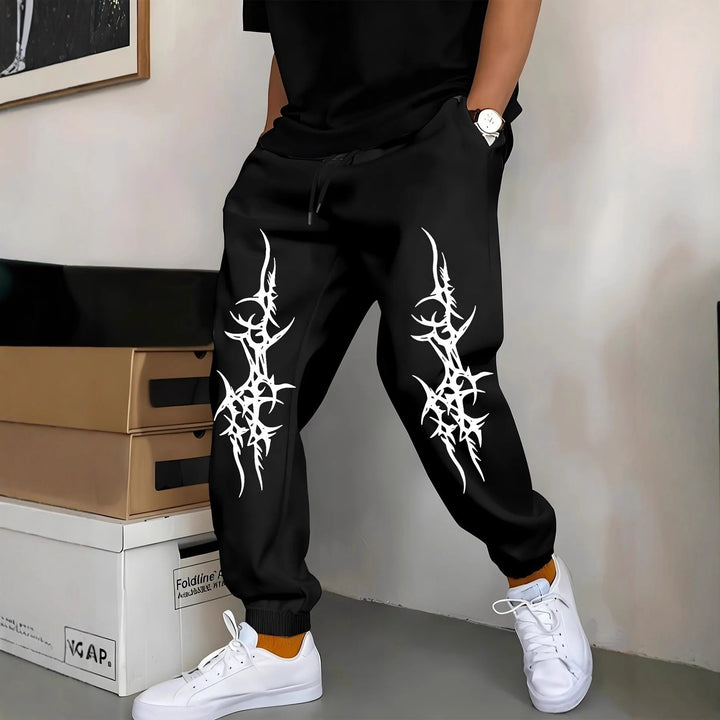 Mäns avkopplande joggingsbyxor med iögonfallande grafisk design Mirla-Eva Jonsson