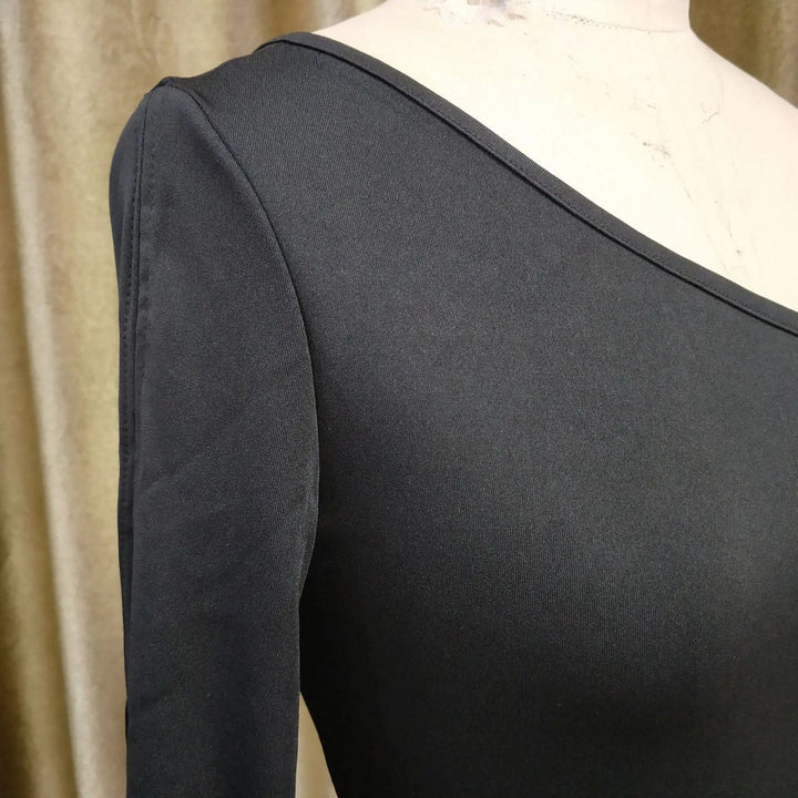 Mirla | Asymmetrisk Enkelaxel Overall-Eva Jonsson