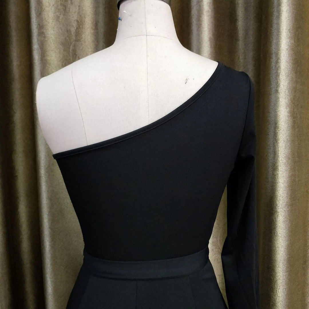 Mirla | Asymmetrisk Enkelaxel Overall-Eva Jonsson