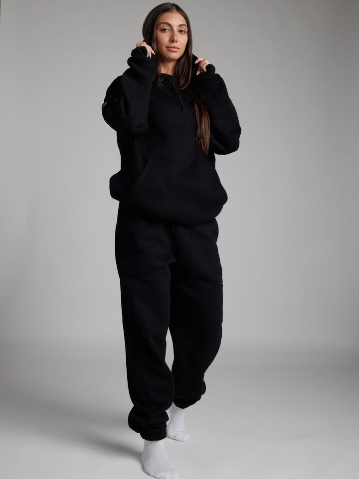 Mirla | Bekväm Rese-Hoodie med Flygplansläge Grafik-Eva Jonsson