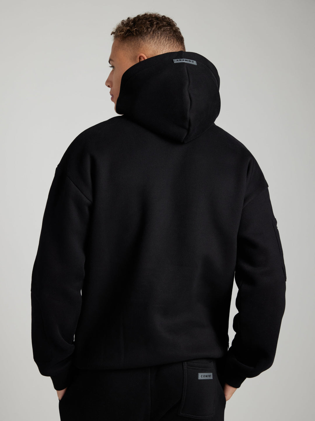 Mirla | Bekväm Rese-Hoodie med Flygplansläge Grafik-Eva Jonsson
