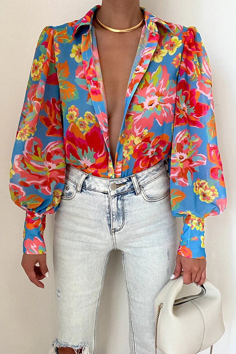 Mirla | Blommig blus med puffärmar för damer-Eva Jonsson