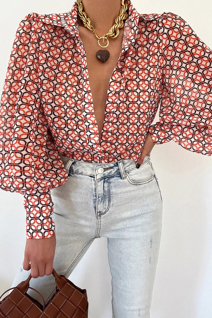 Mirla | Blommig blus med puffärmar för damer-Eva Jonsson
