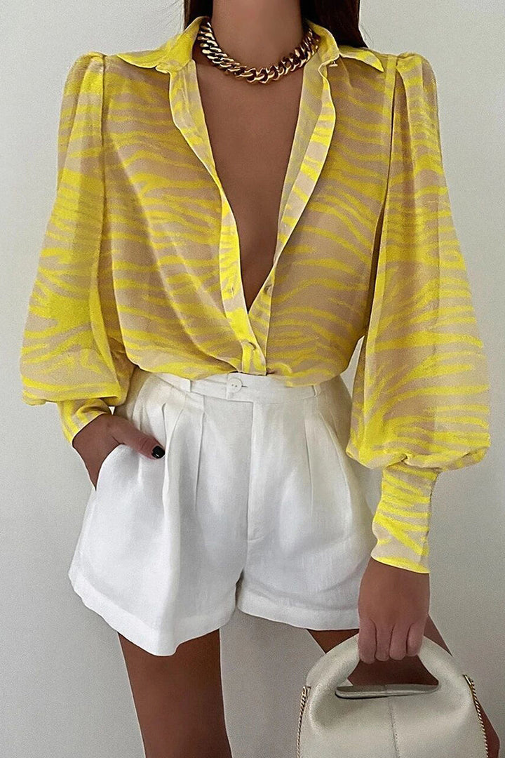 Mirla | Blommig blus med puffärmar för damer-Eva Jonsson