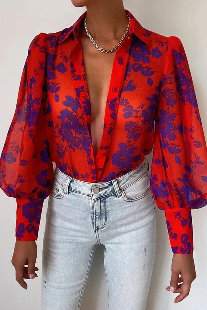 Mirla | Blommig blus med puffärmar för damer-Eva Jonsson