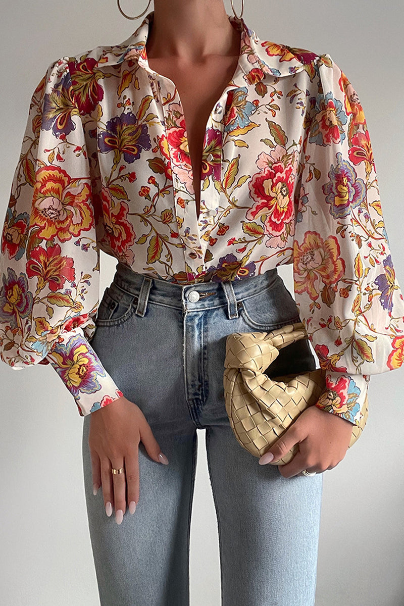 Mirla | Blommig blus med puffärmar för damer-Eva Jonsson