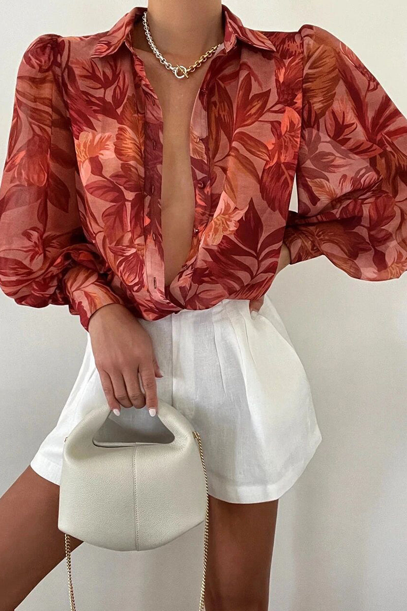 Mirla | Blommig blus med puffärmar för damer-Eva Jonsson