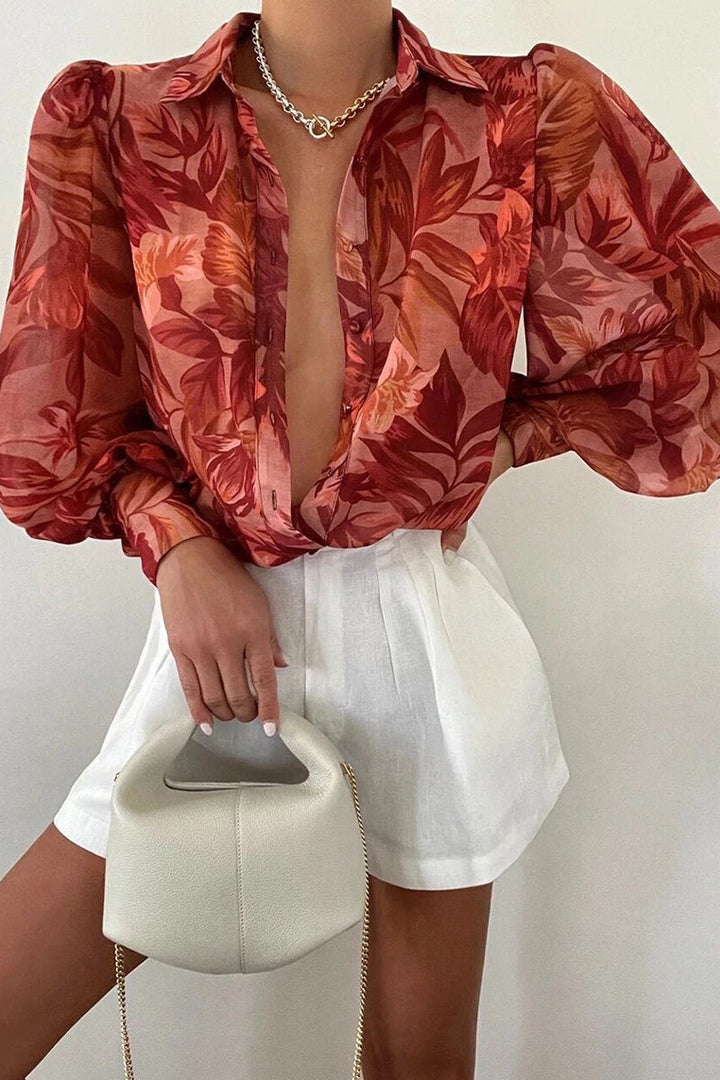 Mirla | Blommig blus med puffärmar för damer-Eva Jonsson