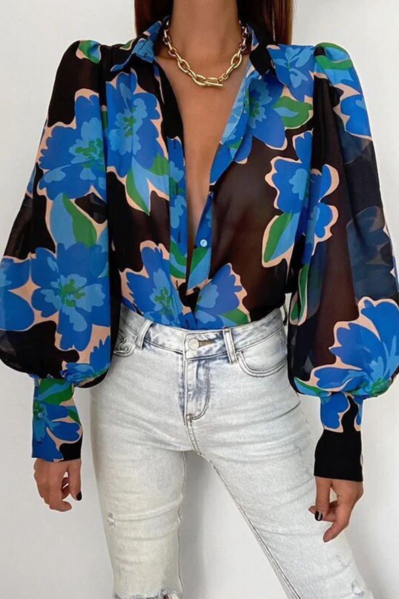 Mirla | Blommig blus med puffärmar för damer-Eva Jonsson
