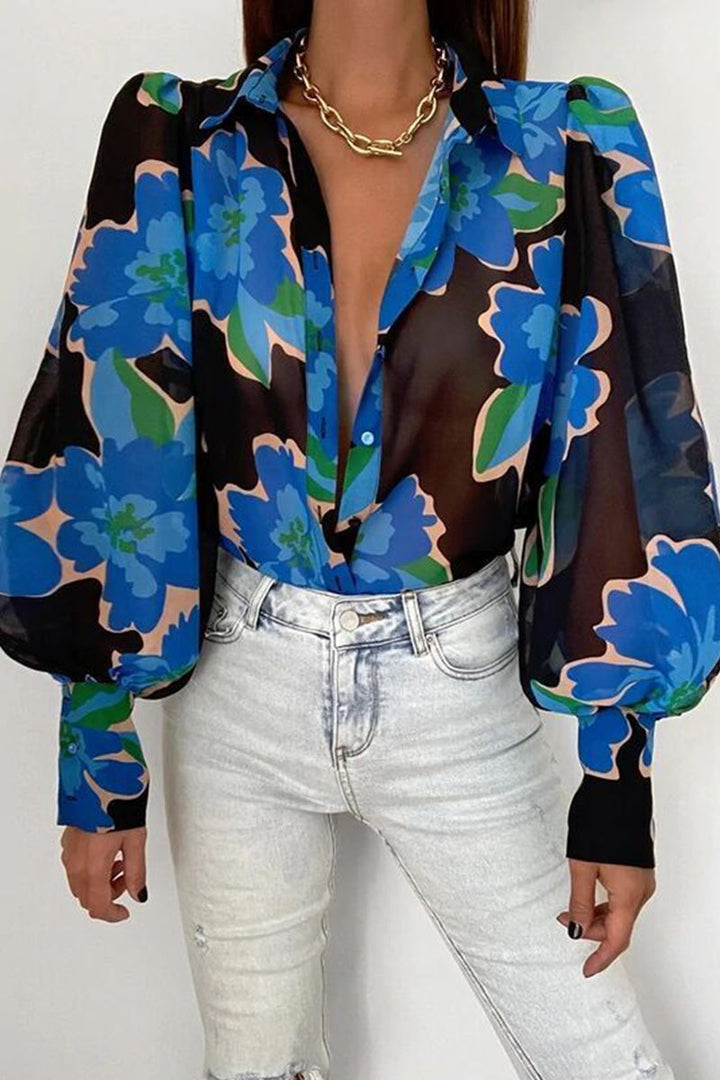 Mirla | Blommig blus med puffärmar för damer-Eva Jonsson