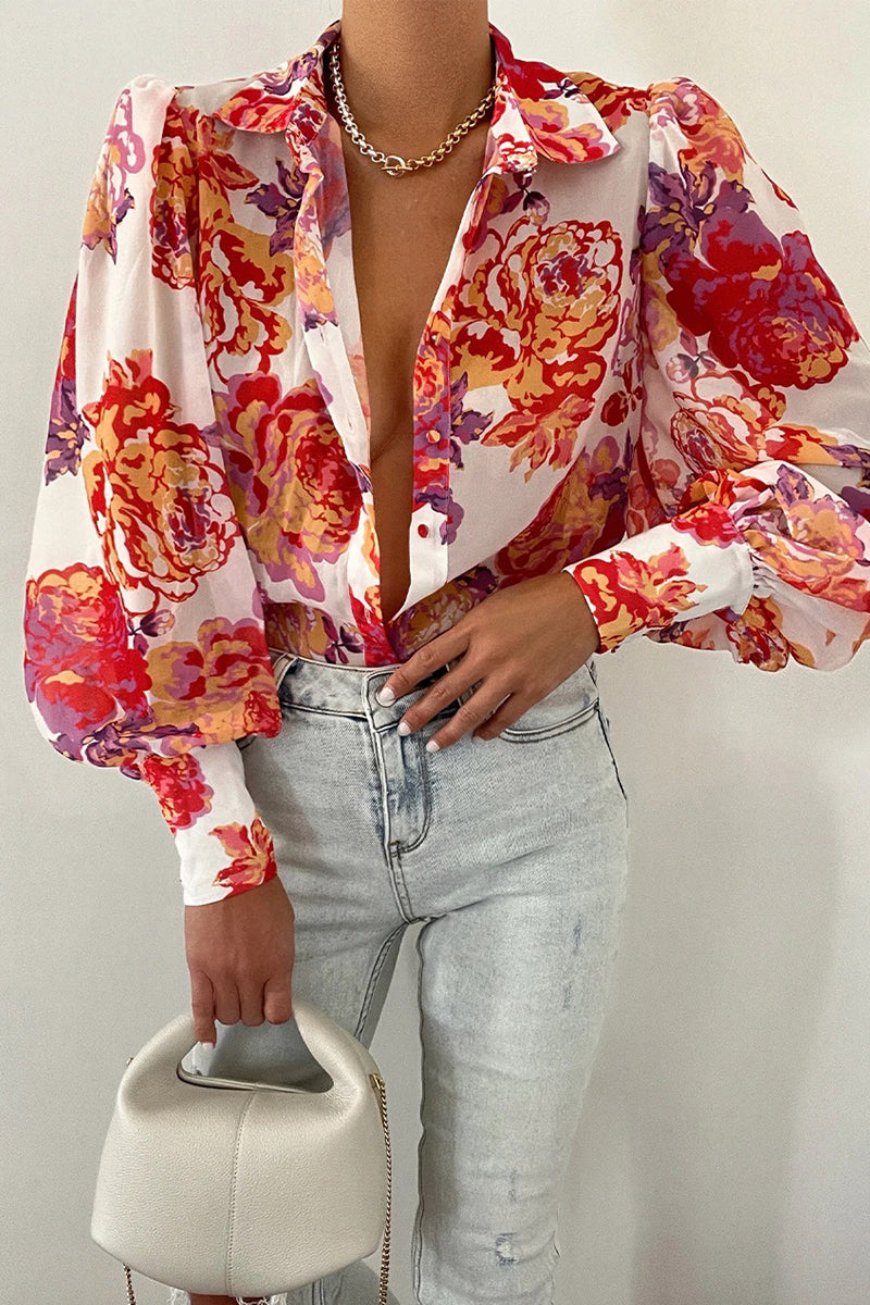 Mirla | Blommig blus med puffärmar för damer-Eva Jonsson