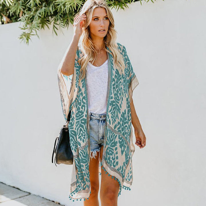 Mirla | Bohemisk Kimono med blommönster och fransdetalj-Eva Jonsson