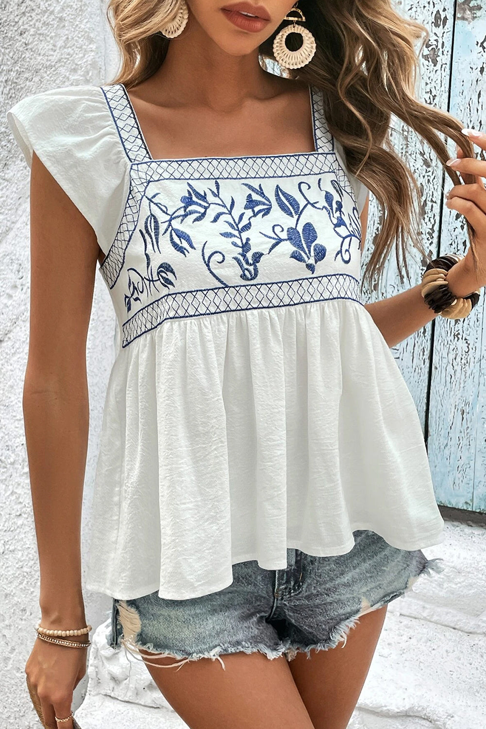 Mirla | Broderad peplum-blus med fyrkantig halsringning för kvinnor-Eva Jonsson