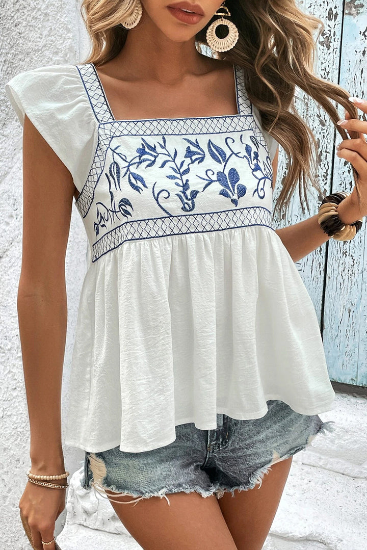 Mirla | Broderad peplum-blus med fyrkantig halsringning för kvinnor-Eva Jonsson