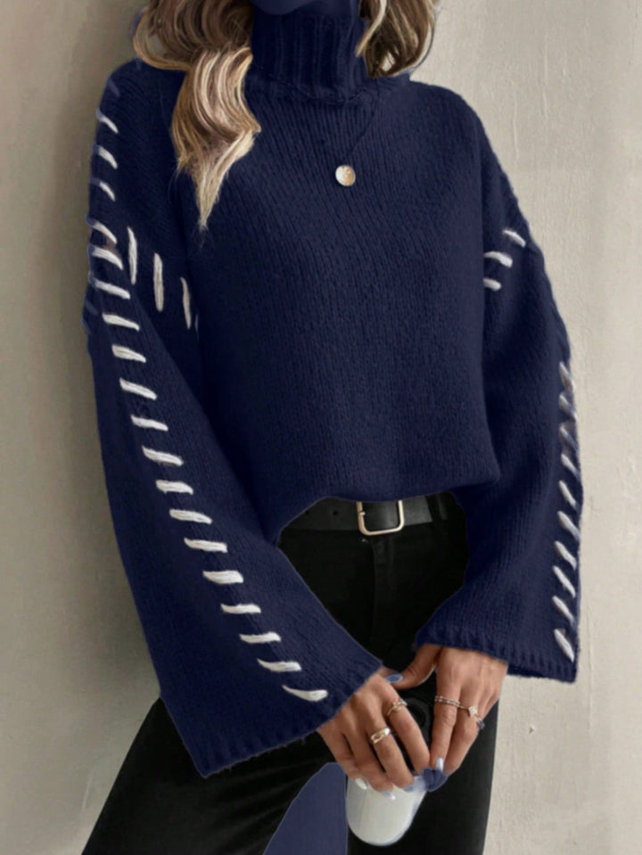 Mirla | Damens Patchwork Stickad Tröja med Kontrasterande Färger och Rullkrage-Eva Jonsson