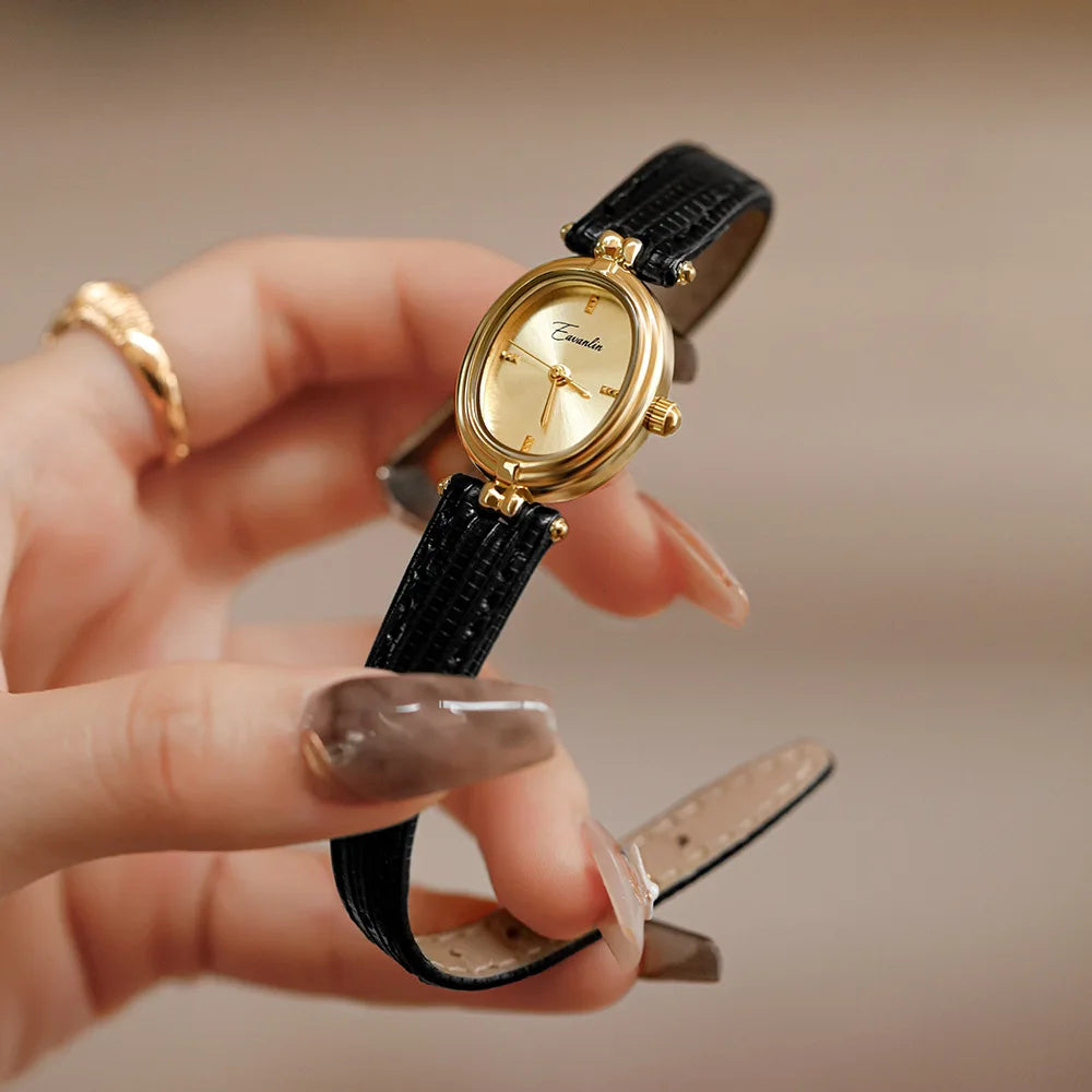 Mirla | Damklocka med smal profil och lyxigt läderarmband-Eva Jonsson
