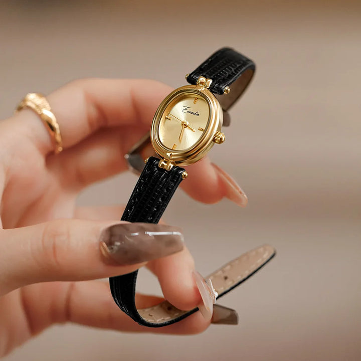 Mirla | Damklocka med smal profil och lyxigt läderarmband-Eva Jonsson