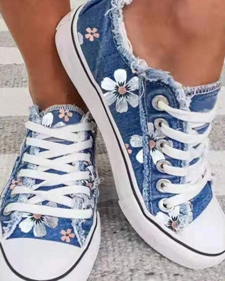Mirla | Denim Sneakers med blommor-Eva Jonsson