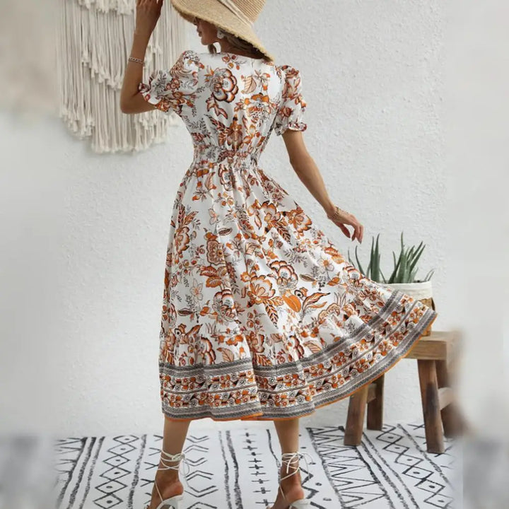 Mirla | Elegant Orange Blomklänning-Eva Jonsson