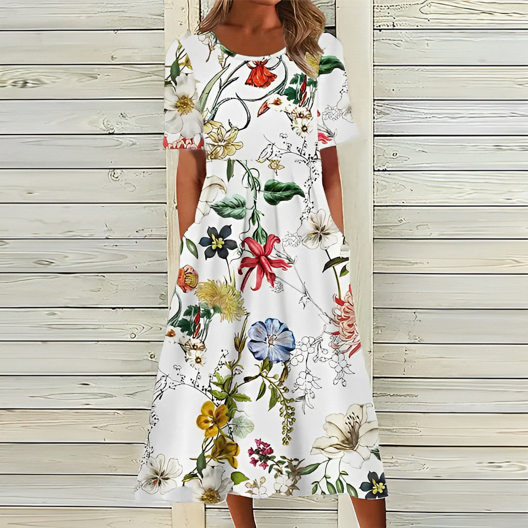 Mirla | Elegant Vit Blommig Midiklänning för Damer-Eva Jonsson