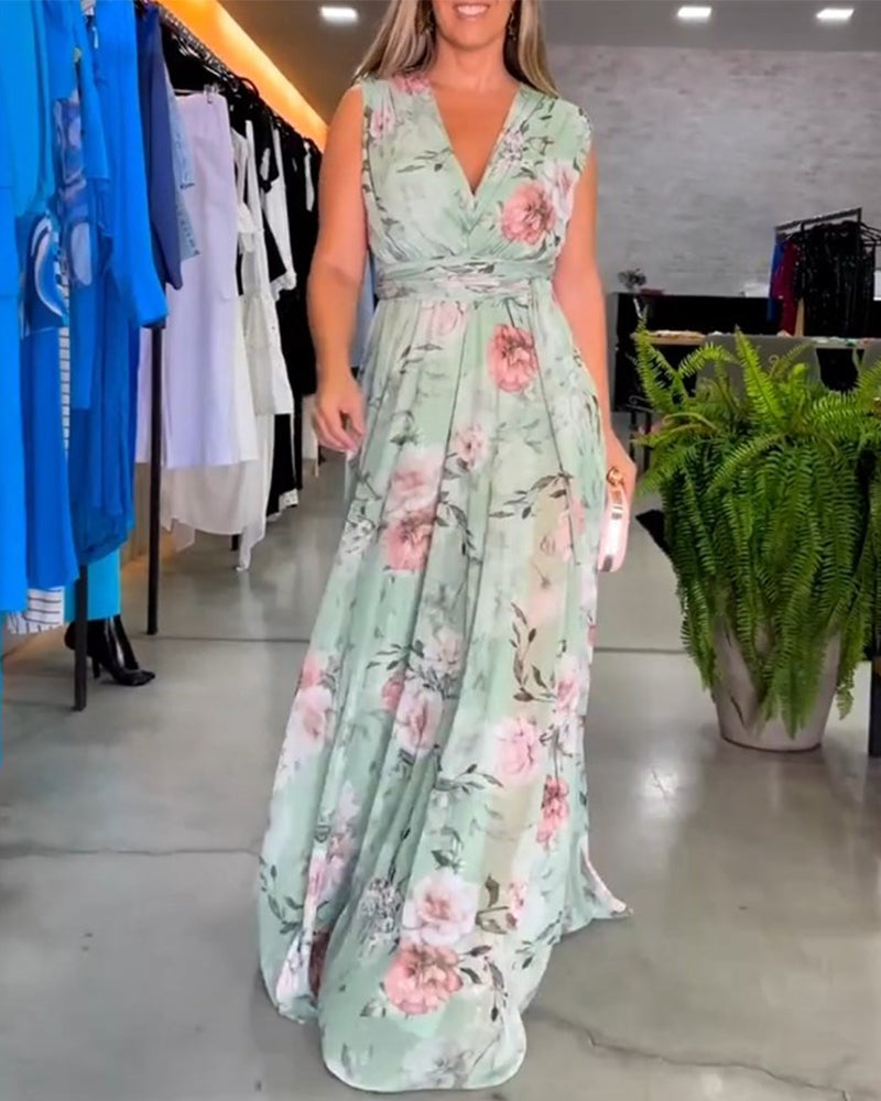 Mirla | Elegant ärmlös V-hals blomtryck klänning-Eva Jonsson