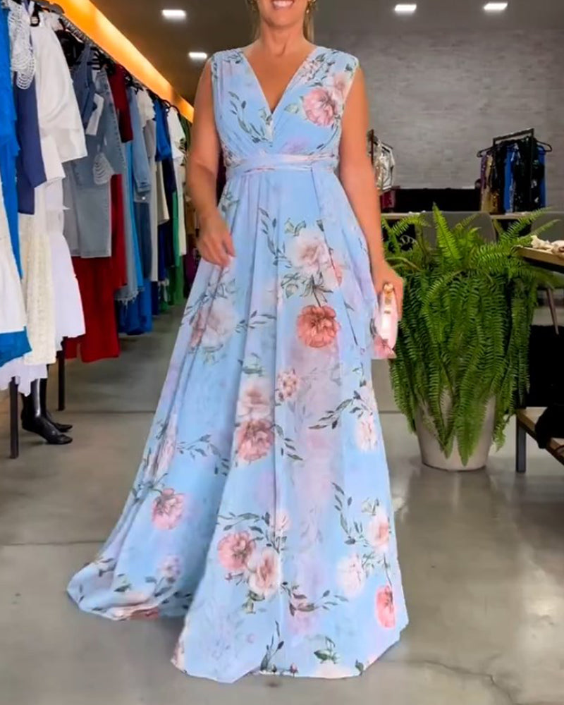 Mirla | Elegant ärmlös V-hals blomtryck klänning-Eva Jonsson
