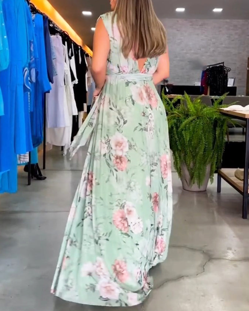 Mirla | Elegant ärmlös V-hals blomtryck klänning-Eva Jonsson