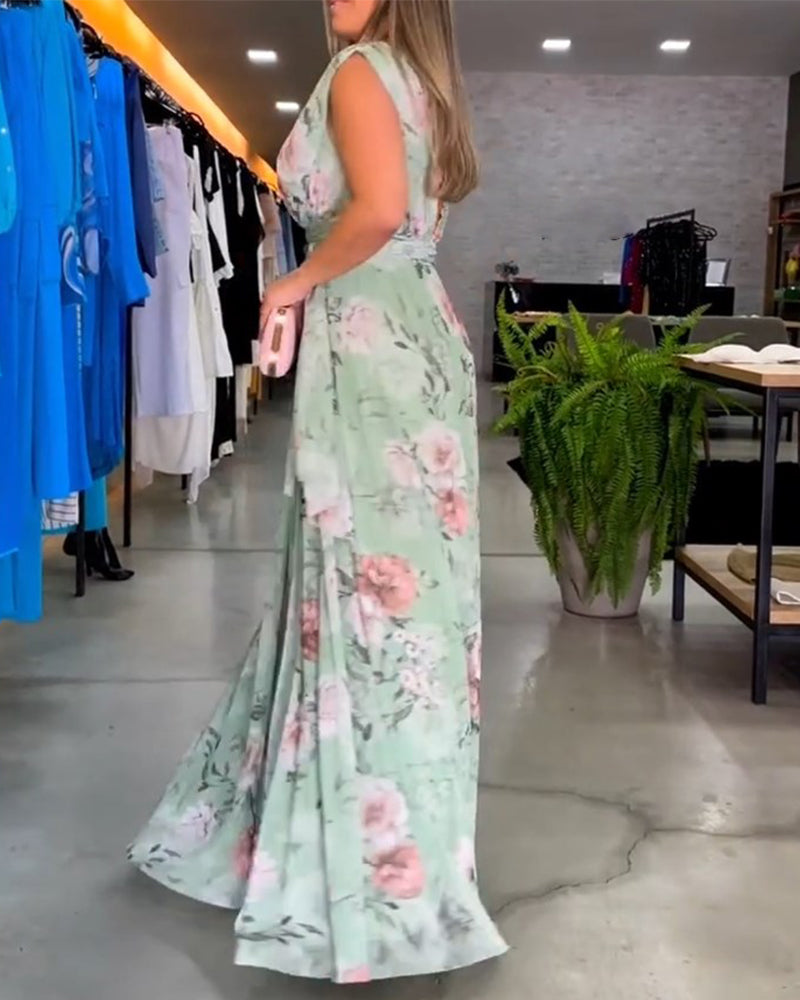 Mirla | Elegant ärmlös V-hals blomtryck klänning-Eva Jonsson