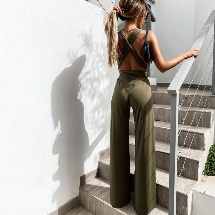 Mirla | Elegant ärmlös jumpsuit med djup V-ringning, midjeband och vid ben-Eva Jonsson