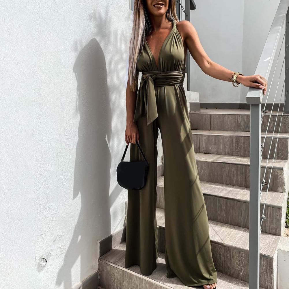 Mirla | Elegant ärmlös jumpsuit med djup V-ringning, midjeband och vid ben-Eva Jonsson