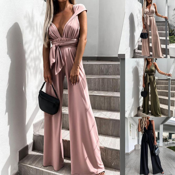 Mirla | Elegant ärmlös jumpsuit med djup V-ringning, midjeband och vid ben-Eva Jonsson