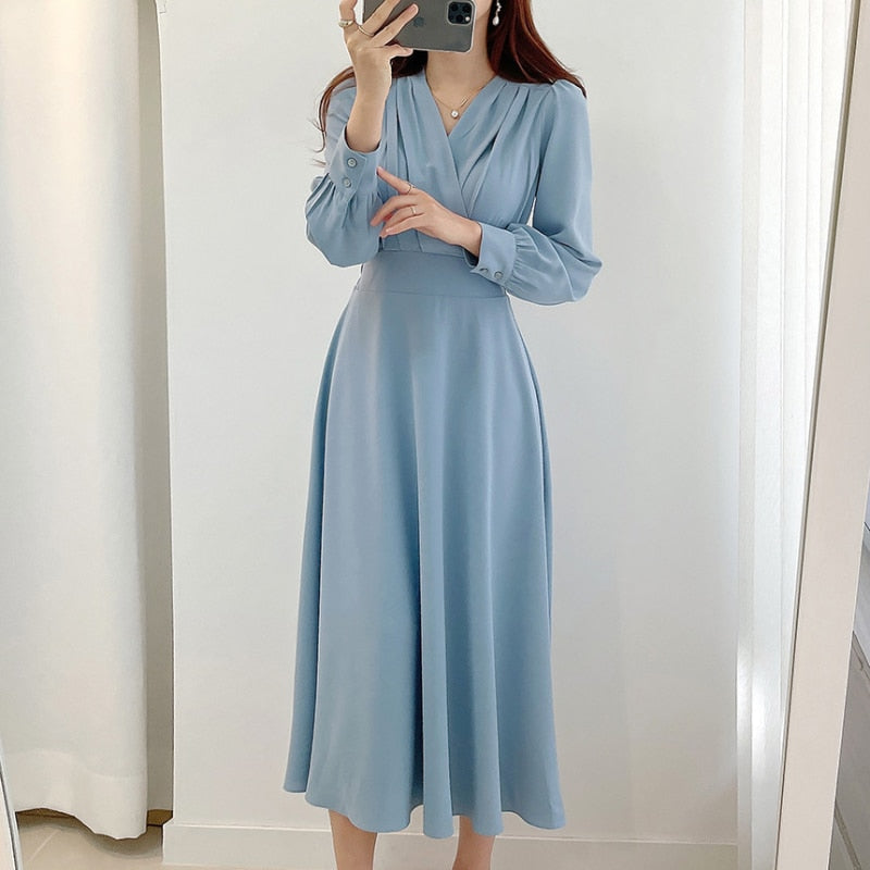 Mirla | Elegant klänning med puffärmar och V-ringning I A-linje-Eva Jonsson