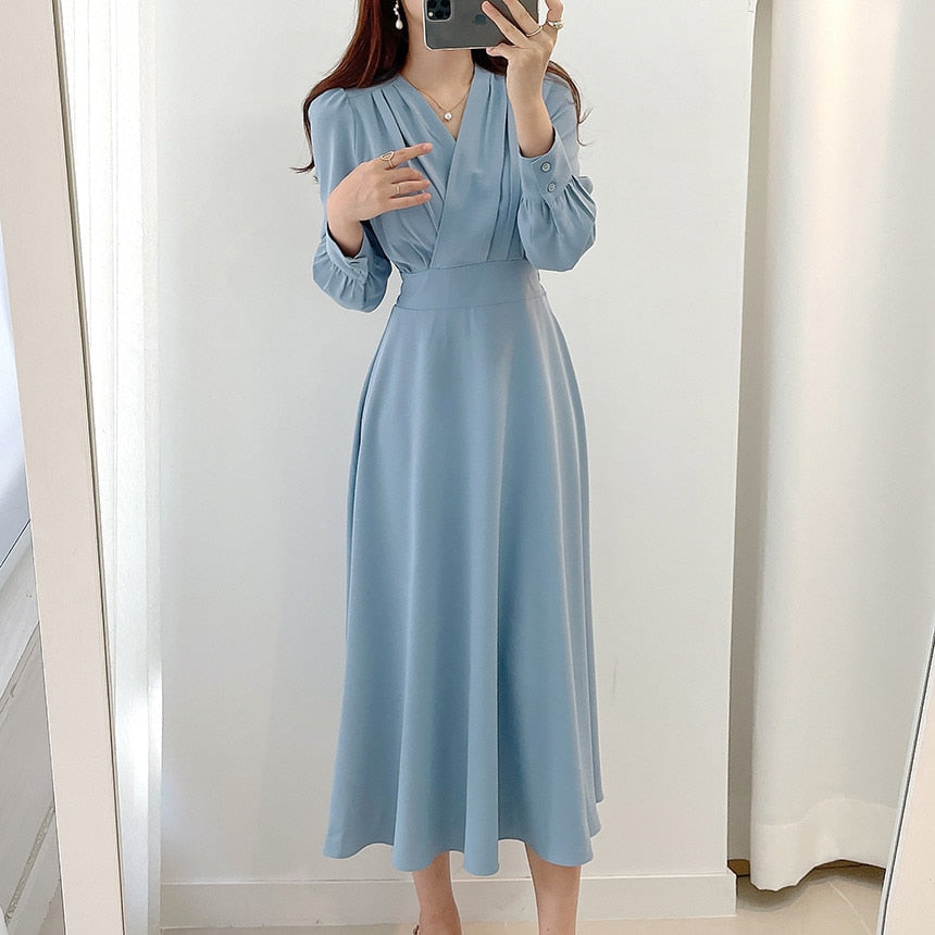 Mirla | Elegant klänning med puffärmar och V-ringning I A-linje-Eva Jonsson
