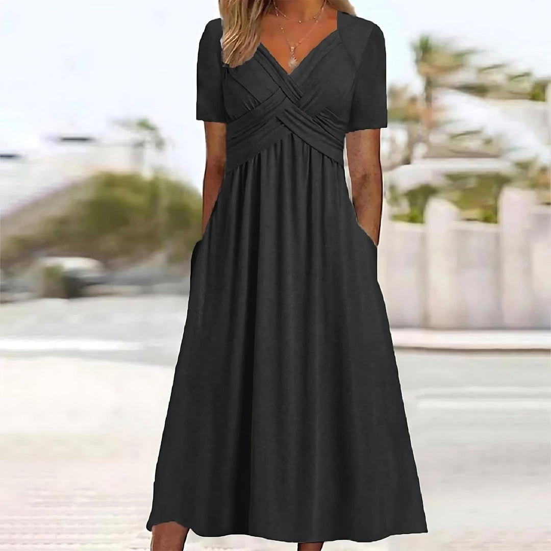Mirla | Elegant midi-klänning med magdeckning-Eva Jonsson