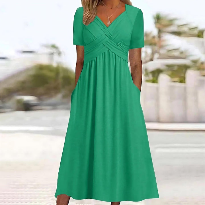 Mirla | Elegant midi-klänning med magdeckning-Eva Jonsson