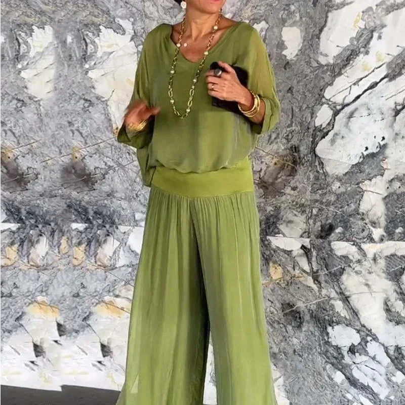 Mirla | Elegant tvådelat set av chiffong topp och byxor med vida ben-Eva Jonsson