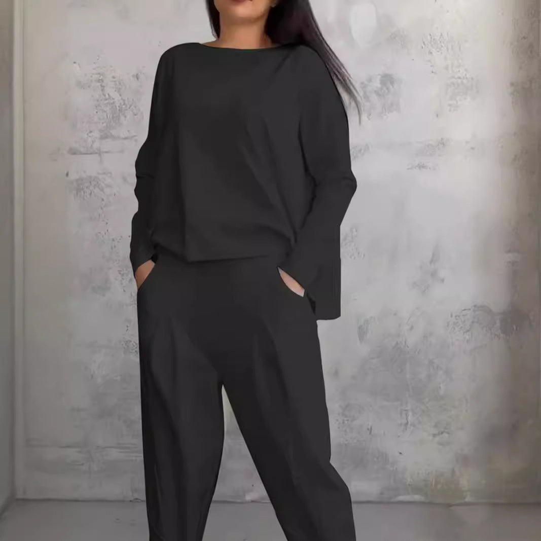 Mirla | Enfärgad Slim-Fit byxdress med rundad halsringning-Eva Jonsson