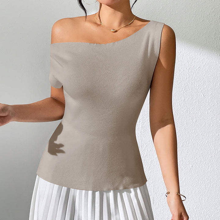 Mirla | Enfärgad ärmlös topp med off-shoulder stickad design-Eva Jonsson